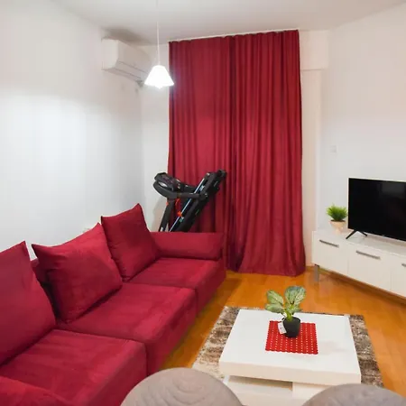The Red Sofa Apartment