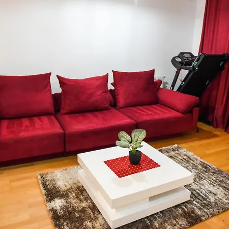 The Red Sofa Apartment