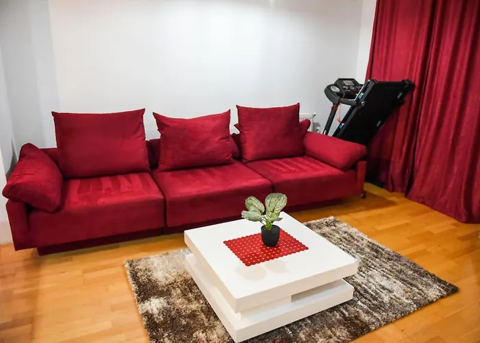 The Red Sofa Apartment